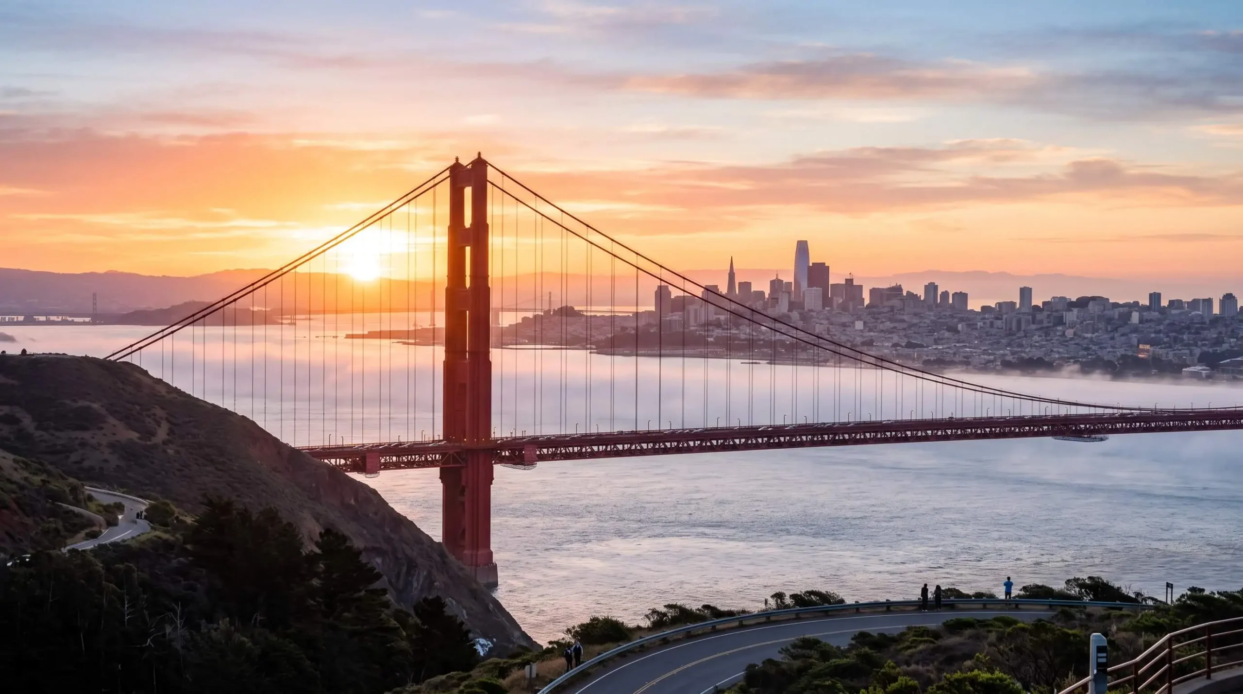 Golden Gate Bridge and the San Francisco skyline at sunrise